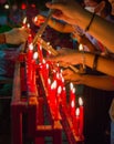 Burning red chinese candle in temple