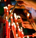 Burning red chinese candle in temple