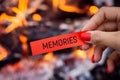 Burning red paper with inscription MEMORIES Royalty Free Stock Photo