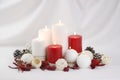 Burning red and white Christmas candles background Royalty Free Stock Photo