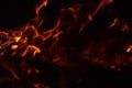 Burning of rice straw at night. Red fire on a black background. Combustion. Royalty Free Stock Photo