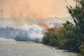 Burning of rice stubble burning straw in rice farmers Royalty Free Stock Photo