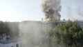 Burning roof of a residential high-rise building, clouds of smoke from the fire. top view Royalty Free Stock Photo