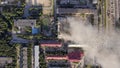 Burning roof of a residential high-rise building, clouds of smoke from the fire. top view Royalty Free Stock Photo