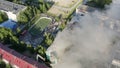 Burning roof of a residential high-rise building, clouds of smoke from the fire. top view Royalty Free Stock Photo