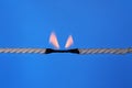 Burning rope at breaking point Royalty Free Stock Photo