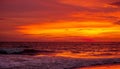 Burning Sky. The wave are nice while the sky full of burning color Royalty Free Stock Photo