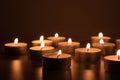 Burning small candles in the dark, spirituality scene, darkness Royalty Free Stock Photo