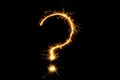 Burning sparkler question mark isolated on black background Royalty Free Stock Photo