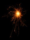 Burning sparklers isolated on black background.