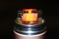 Burning staple staggered fused clapton coil in rebuildable dripping atomizer