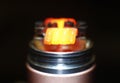 Burning staple staggered fused clapton coil in rebuildable dripping atomizer