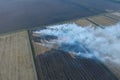 Burning straw in the fields after  wheat crop Royalty Free Stock Photo