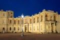 A burning street lamp in the background of the gallery of the Great Gatchina Palace. Gatchina, Russia Royalty Free Stock Photo