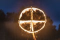 Burning sun cross at Kupala Night. Slavic holiday celebrated on the shortest night of the year, summer solstice