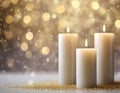 Cream color candles in festive bokeh background