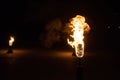 Burning Torch in the Night at black background Royalty Free Stock Photo