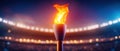 Burning Torch in a Stadium with Dramatic Lighting Royalty Free Stock Photo