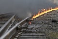 Burning Train tracks interchange during repairs Royalty Free Stock Photo