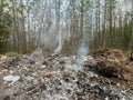 Burning trash in landfills
