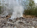 Burning trash in landfills