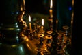 Burning warm candles at a ceremony in the temple.