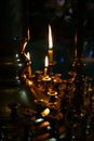 Burning warm candles at a ceremony in the temple.