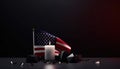 Burning white candle on dark gradient background and american flag Royalty Free Stock Photo