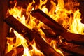 Burning wood in the fireplace, bright red fire Royalty Free Stock Photo