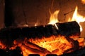 Burning wood in fireplace warmth Royalty Free Stock Photo