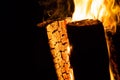 Burning and glowing wood logs