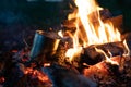 Burning wood at night. Campfire at touristic camp at nature in mountains. Flame amd fire sparks on dark abstract Royalty Free Stock Photo
