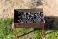 Burning wood in an open charcoal grill, coals in the brazier Royalty Free Stock Photo