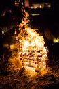 Burning wood pile fire closeup