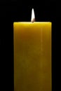 Burning Yellow Candle isolated Royalty Free Stock Photo