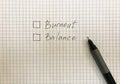 burnout or balance chechboxex on checkered sheet of paper. Black pencil near to choose. Burnout at work concept Royalty Free Stock Photo