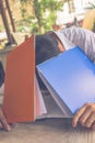 Exhausted businessman falling asleep while working on paperworks Royalty Free Stock Photo