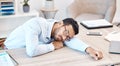 Burnout, sleeping and tired with an overworked business man asleep at his desk in the office. Exhausted, fatigue and Royalty Free Stock Photo