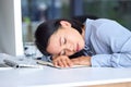 Burnout, tired and business woman sleeping on the desk in her modern office while planning a strategy. Fatigue Royalty Free Stock Photo