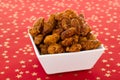 Burnt almonds in white dish Royalty Free Stock Photo