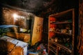 Burnt apartment house interior. Burned furniture and charred walls in black soot