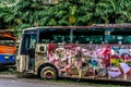 Burnt Bus wrackage parked on side the street photo taken in Jakarta Indonesia