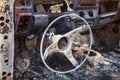 Burnt car interior with steering wheel after the accident Royalty Free Stock Photo