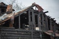 Burnt damaged wood old rural house close up