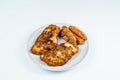 Burnt Grill Fried Chicken Breast Fillets with Sausages on White Plate Isolated Royalty Free Stock Photo