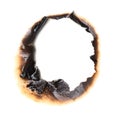 Burnt hole in a paper Royalty Free Stock Photo