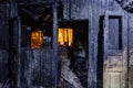 Burnt house. Burned furniture, door, charred walls and ceiling