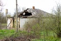 Burnt house half-burnt roof of a house with half a roof in the Kirovograd region Royalty Free Stock Photo