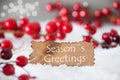 Burnt Label, Snow, Bokeh, Text Seasons Greetings Royalty Free Stock Photo