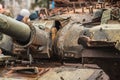 Burnt and melted rusty wreckage of a Soviet Russian-made tank Royalty Free Stock Photo